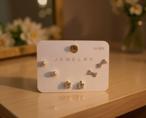 Eleganti Orecchini in Stile Francese, Set di 3 Paia con Borchie in Argento, Perle, Stelle e Fiocchi - Product Image 2