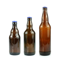 Bouteilles de bière en verre ambré de haute qualité avec bouchon et impression sérigraphique 350ml/530ml/750ml pour l'eau/les jus/les boissons
