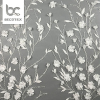 Tissu de dentelle perlée 3D écologique Robe de mariée de luxe Broderie perlée Tissu de dentelle de tulle français de haute qualité