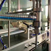 Machine de remplissage semi-automatique pneumatique CE pour sauces, cosmétiques, crèmes, beurre de cacahuète, tomates et pâtes liquides, avec piston manuel