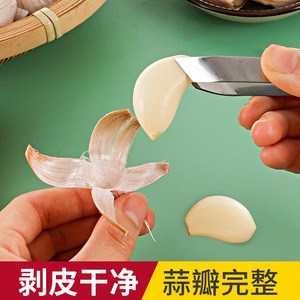 Éplucheur d'ail en acier inoxydable, outil de cuisine domestique manuel et durable pour un épluchage rapide et facile des gousses d'ail - Product Image 5
