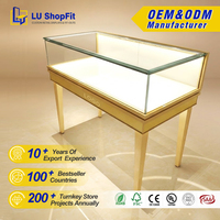 Vitrines de bijouterie dorées en gros pour expositions, présentoirs de bijoux en diamant, vitrines pour bijouteries en or
