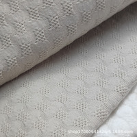 Tissu en coton biologique jacquard à bulles personnalisé 170G directement en usine