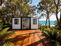 Casa Contenedor Expandible con Puertas y Ventanas de Aluminio de Puente Roto, Diseño Personalizable y Apariencia Negra