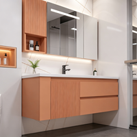 Ensembles de meubles-lavabos modernes en bois avec aspect marbre et miroir LED encadré pour projets résidentiels et hôteliers, personnalisation OEM