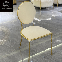 Chaise de salle à manger de luxe en métal doré moulé, forme branche, avec assise en tissu rembourré et dossier rond, pour salle à manger de villa