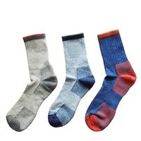 Chaussettes de sport en laine mérinos rembourrées thermo d'extérieur chaudes et épaisses pour l'hiver de haute qualité
