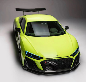 ชุดแต่งคาร์บอนไฟเบอร์สไตล์ Capristo สำหรับอัพเกรด Audi R8 ประกอบด้วยลิ้นกันชนหน้าแบบใหม่ ดิฟฟิวเซอร์ สปอยเลอร์ สเกิร์ตข้าง และกันชนรถยนต์ - Product Image 4