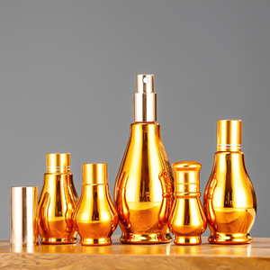 Botella <span class=keywords><strong>de</strong></span> Vidrio <span class=keywords><strong>de</strong></span> Lujo con Recubrimiento Electrolítico Dorado <span class=keywords><strong>de</strong></span> 5ml 10ml 15ml 20ml 30ml 50ml 100ml para Cosméticos, Aceites Esenciales y Perfumes con Tapa - Product Image 1