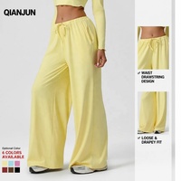Pantalon de yoga ample taille basse pour femme, de haute qualité, avec poches et cordon de serrage, idéal pour le fitness et la détente