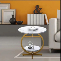 Table basse ronde à deux niveaux JIAMEIJIA avec plateau en marbre et cadre doré pour salon