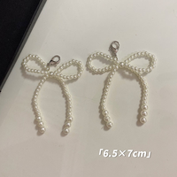 Nouvelle boucle de chaussure unisexe tendance style coréen avec nœud perlé et pendentif pompon