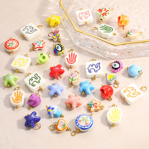 Accessoires de bijoux en acier inoxydable pour la fabrication de colliers, formes variées : étoile, papillon, œil porte-bonheur, style peint, pour le marché international - Product Image 1