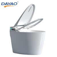 WC intelligent moderne à poser au sol, corps monobloc arrondi, bouton latéral, indicateur bleu, réservoir intégré, faible pression