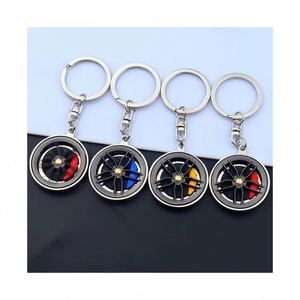 Llavero giratorio de metal con diseño de disco de freno de pinza, rojo, azul, amarillo, regalo creativo - Product Image 1