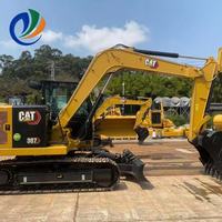 Caterpillar 307 d'occasion, modèle 2023, poids opérationnel de 6,9 tonnes, moteur et pompe