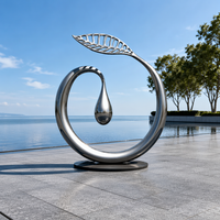 Sculpture moderne abstraite en acier inoxydable poli miroir, motif feuille et goutte d'eau, couleurs personnalisables pour aménagement paysager extérieur