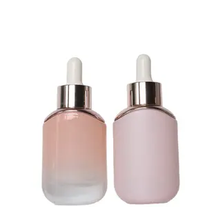 Luxe 30Ml 50Ml Aangepaste Kleur Transparant Glas Druppelaar Essentiële Olie Fles Met Gloden Sliver Schouder