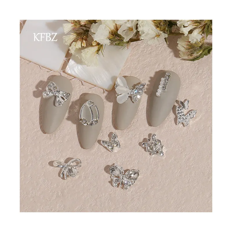 Nieuwe Nail Art Sieraden 3d Vlinder Boog Diamanten Zilveren Glitter Nagel Decoratie Zirkoon Lichtmetalen Metalen Vlinder Nail Strass