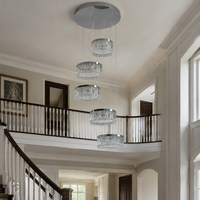 Lustre en cristal multi-anneaux pour escalier, luminaire suspendu en métal noir pour hall de villa à plafond haut