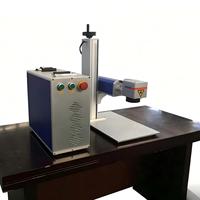 Mini Máquina de Marcado Láser de Fibra para Grabado en Plástico, Piedra, Metal y Goma