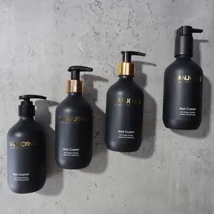 Botellas de plástico PP/PET de color negro mate con logotipo dorado brillante con sellado de bomba para lavado corporal, champú, crema para el cabello, embalaje de cera