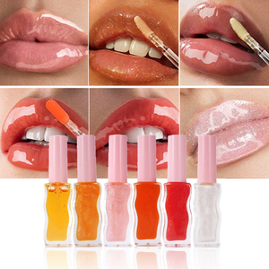ลิปกลอสสีทองแวววาวแวววาวแวววาวสีชมพูอ่อนหวานมีรสชาติแบบวีแกนพิมพ์โลโก้ - Product Image 2