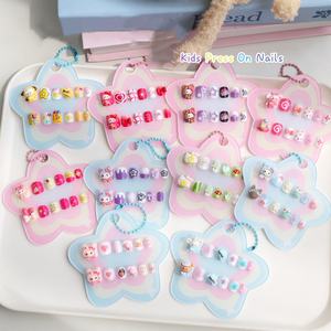 <span class=keywords><strong>Faux</strong></span> <span class=keywords><strong>ongles</strong></span> à presser Qianya <span class=keywords><strong>pour</strong></span> enfants, 12 pièces, motif dessin animé - Mignons motifs fleurs, nœuds et bonbons <span class=keywords><strong>pour</strong></span> filles de 3 à 8 ans, amovibles, réutilisables, vente en gros - Product Image 2