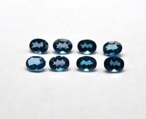 Prix d'usine en gros de haute qualité 7X9mm taille ovale topaze bleue de Londres naturelle certifiée IGCI pierre précieuse à facettes en vrac par carat - Product Image 1