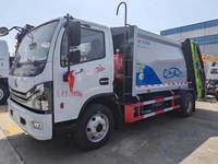 Camion poubelle compactable avec benne capable de suspendre deux bacs à déchets en plastique de 240 L