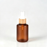 Bouteille en plastique ronde Boston populaire avec pompe en bambou pour cosmétiques, contenant givré pour gel douche, emballage 500 ml, bouteille PET