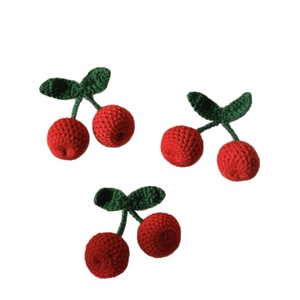 Accessoires faits main à motif cerise : bonnets tricotés, écharpes, chaussures, chaussettes, coques de téléphone, porte-clés – Doux et ornés de fleurs artificielles - Product Image 1