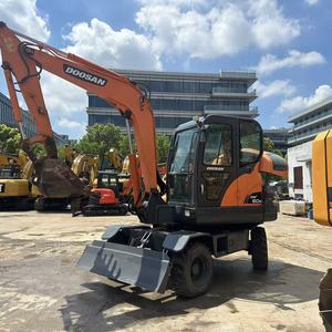 รถขุดล้อยาง Doosan DX60W มือสอง ขนาด 6 ตัน พร้อมเครื่องยนต์ เกียร์ และปั๊ม สำหรับงานก่อสร้างและงานถนน - Product Image 4