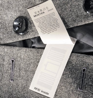 Etiquettes d'entretien et de lavage Etiquettes Rfid Uhf Etiquettes de vêtements Passive Rfid Etiquette de vêtements Etiquette Rfid Textil pour vêtements