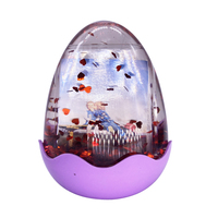 Bon marché Vente en gros Boule à neige en forme d'oeuf de Pâques pour enfants jouets Souvenir Mini photo numérique fantaisie flotteur cadre transparent