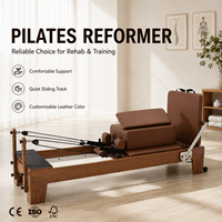 Machine de Pilates Reformer en bois de noyer sur mesure OEM, équipement certifié CE pour usage commercial en studio