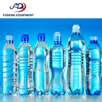 Machine de remplissage linéaire pneumatique automatique d'occasion prête à l'emploi pour la production de liquides (boissons, huiles, cosmétiques, produits chimiques, aliments)