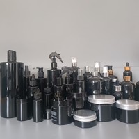 Bouteilles d'emballage et pot de couleur noire en plastique de luxe de 10ml à 1000ml pour la croissance des cheveux
