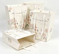 Sacs cadeaux trapézoïdaux floraux abricot 30*20*35cm, pochette d'emballage en papier 230gsm pour bouquets de fleurs fraîches.