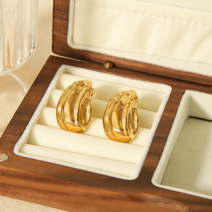 Pendientes Huggie en forma de lágrima de acero inoxidable, color dorado, textura de semilla de melón, pendientes colgantes de moda para mujer - Product Image 1