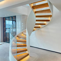Escalier en colimaçon moderne en acier inoxydable finition or avec marches en marbre pour usage intérieur en villa, Foshan