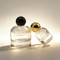 Botella de Perfume Redonda Minimalista de Vidrio, Cuerpo Transparente con Tapa de Bola Dorada, Envase Vacío para Perfume y Aromaterapia