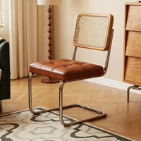 Chaise cantilever moderne du milieu du siècle avec dossier en rotin et coussin en cuir, chaise de salle à manger vintage pour la maison et le café