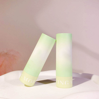Tube d'emballage cosmétique sans air à couvercle rabattable, hermétique, rond, vert dégradé, en plastique, pour baume à lèvres et rouge à lèvres, vente en gros