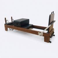 Harmony Glow FAS-Grade Bois de noyer nord-américain Machine de Pilates Reformer avec Boîte d'assise, Barre de pieds réglable et Ressorts, Usage commercial
