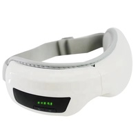 Masseur oculaire intelligent à vibration et compresse chaude, dispositif à coussin d'air pour la protection des yeux, avec pression vibrante et chaleur.