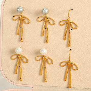 ต่างหูมุกประดับโบว์สีขาวสำหรับผู้หญิงสวมใส่ทุกวัน - Product Image 1