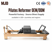 Lit de Pilates Reformer en Bois avec Barre Fixe, Revêtement en Cuir, Couleurs Personnalisables OEM/ODM pour Distributeurs et Studios de Pilates