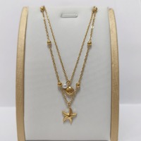 Collier double couche Huibao pour l'été, avec breloque étoile de mer et coquillage, fausse perle, en acier inoxydable, bijoux délicats sur le thème de l'océan pour femme