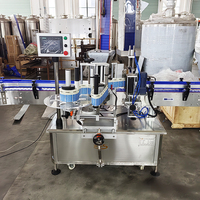 Remplisseuse rotative automatique à pression négative en acier inoxydable remplisseuse d'embouteillage liquide de jus de vodka et de whisky